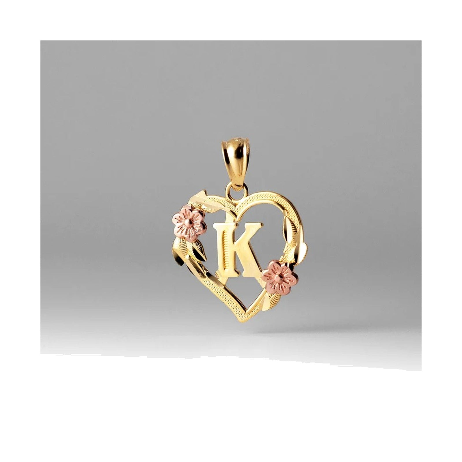 10K gold heart and flower initial pendant K on clean white background