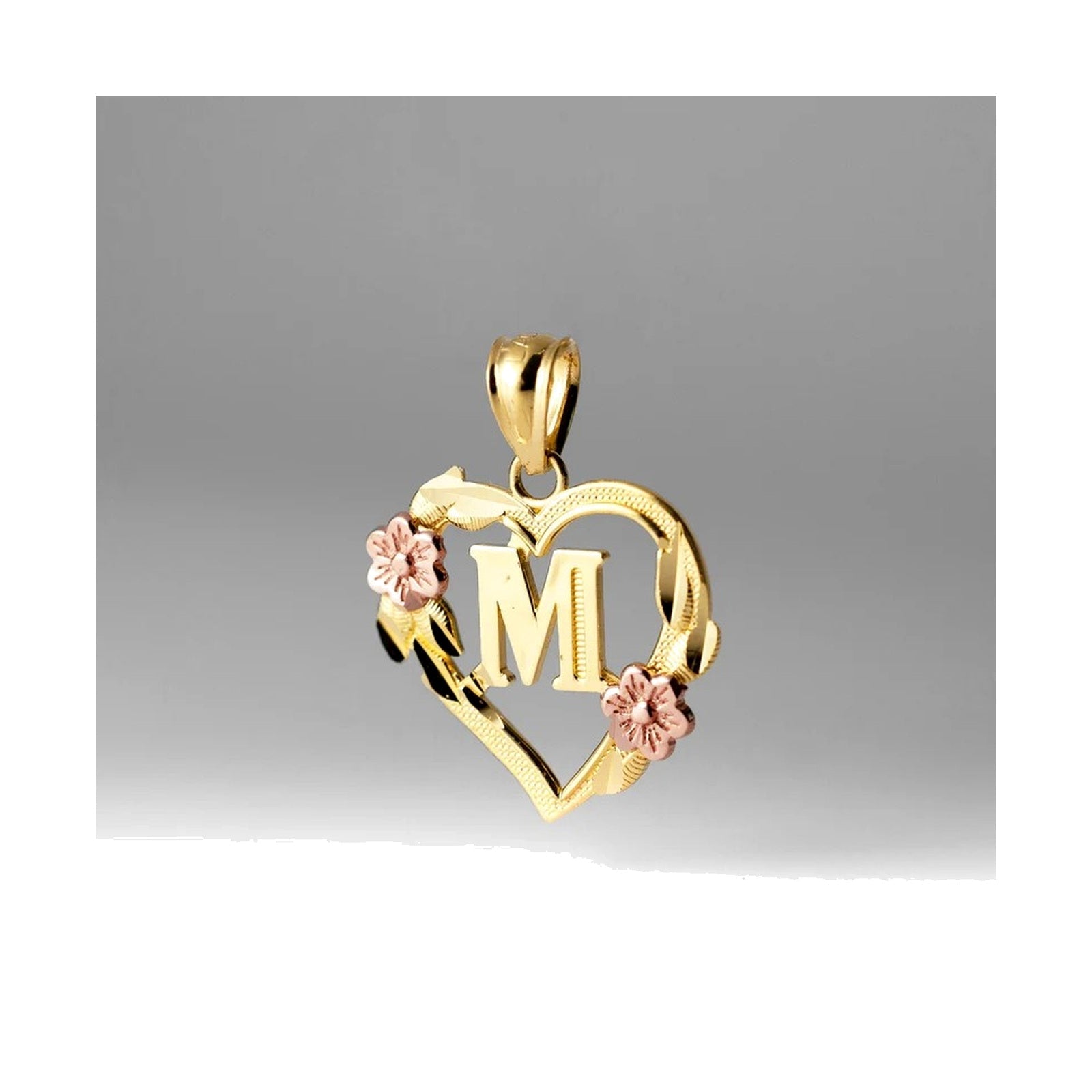 10K gold heart and flower initial pendant M on clean white background