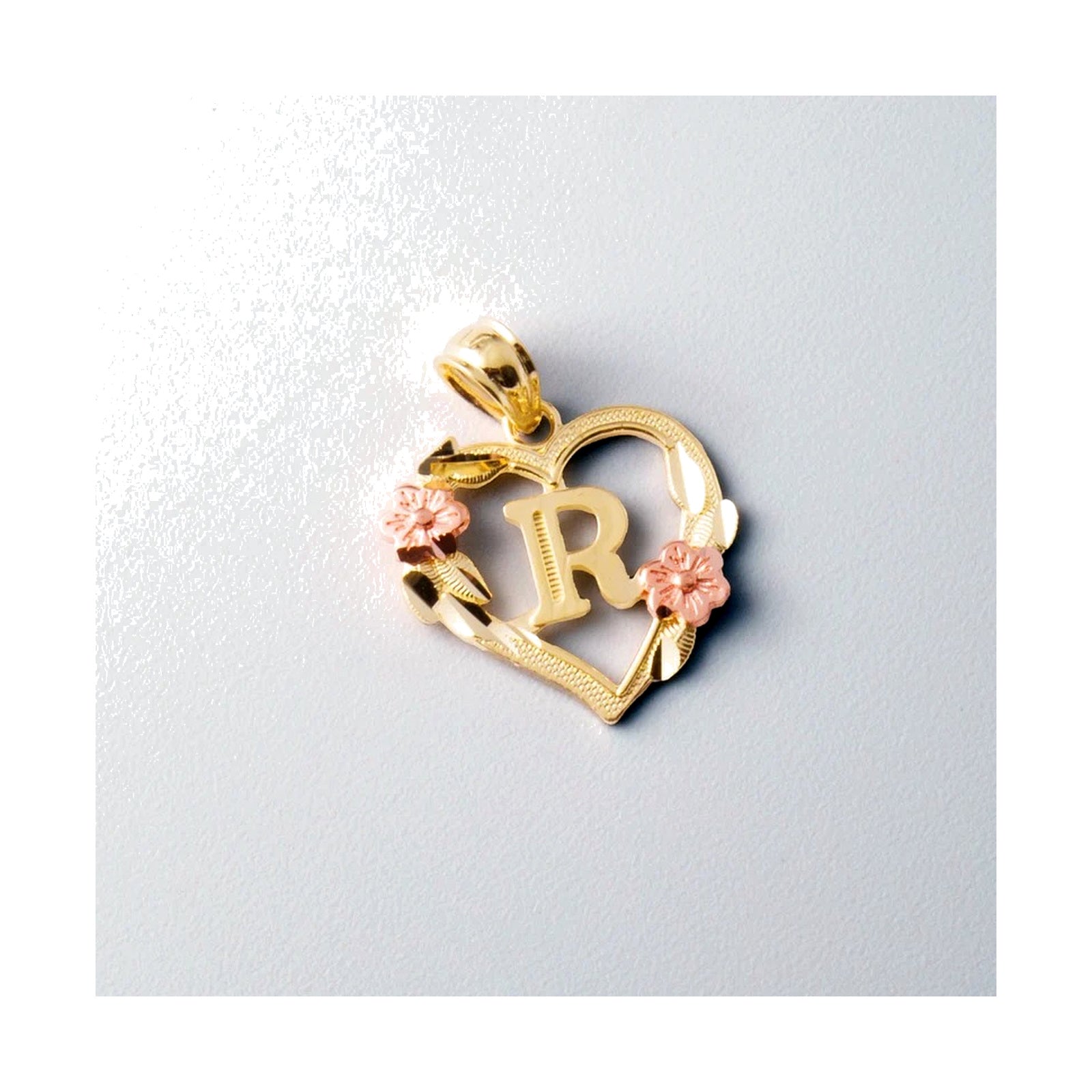 10K gold heart and flower initial pendant R on clean white background