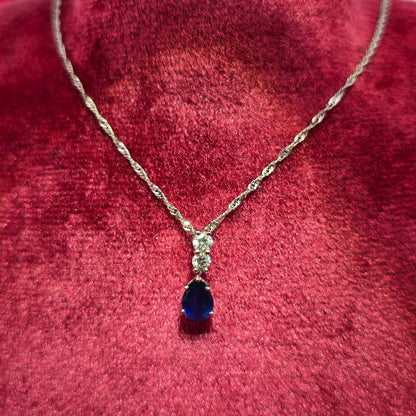 18K White Gold Blue Sapphire Pendant with Diamond Twisted Curb Chain | 1/5 CTW Necklace for Women