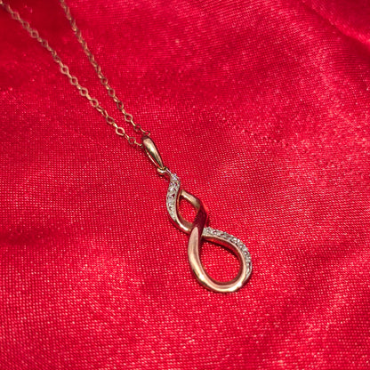 10K Yellow Gold Twisted Drop Diamond Pendant Necklace for Women | 0.16 CTW