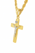 10K two-tone gold crucifix pendant and rope chain detail