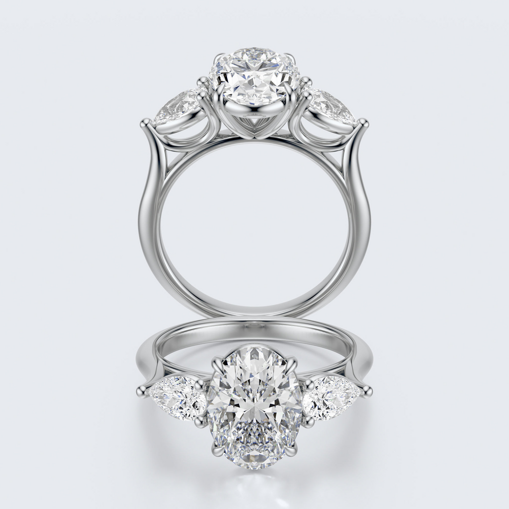 White gold three-stone oval and pear lab-grown diamond engagement ring full front and profile views