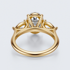 Yellow gold three-stone oval and pear lab-grown diamond engagement ring underside view