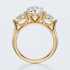 Yellow gold three-stone oval and pear lab-grown diamond engagement ring side profile