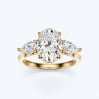 Yellow gold three-stone oval and pear lab-grown diamond engagement ring front view