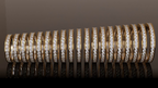 Infinity one-row lab grown diamond eternity band size range in 14K yellow gold
