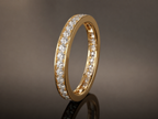Infinity one-row lab grown diamond eternity band in 14K yellow gold